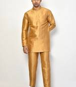 Elegant occasion wear gold raw silk short kurta with pants