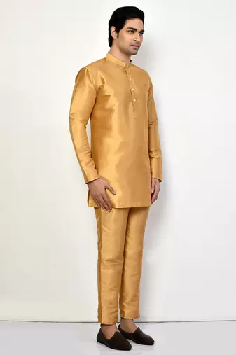 Elegant occasion wear gold raw silk short kurta with pants
