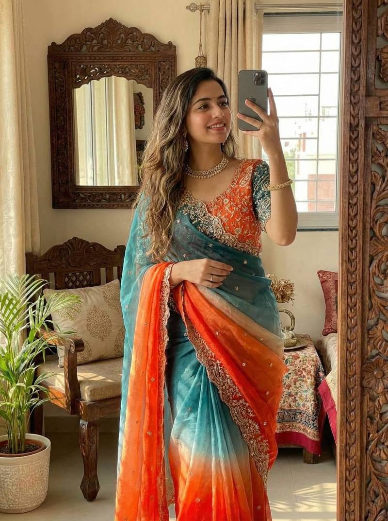 Orange Color embroidery sequence work sartin  Saree