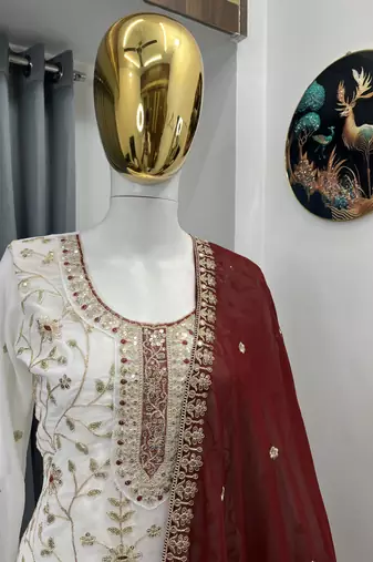 White color faux georgette embroidery work long party wear plazo suit