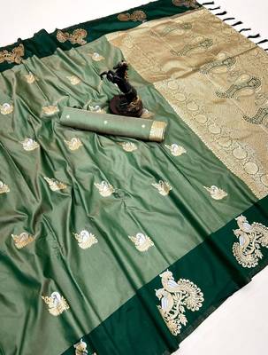 Green soft silk saree with zari weaving & peacock motifs 1