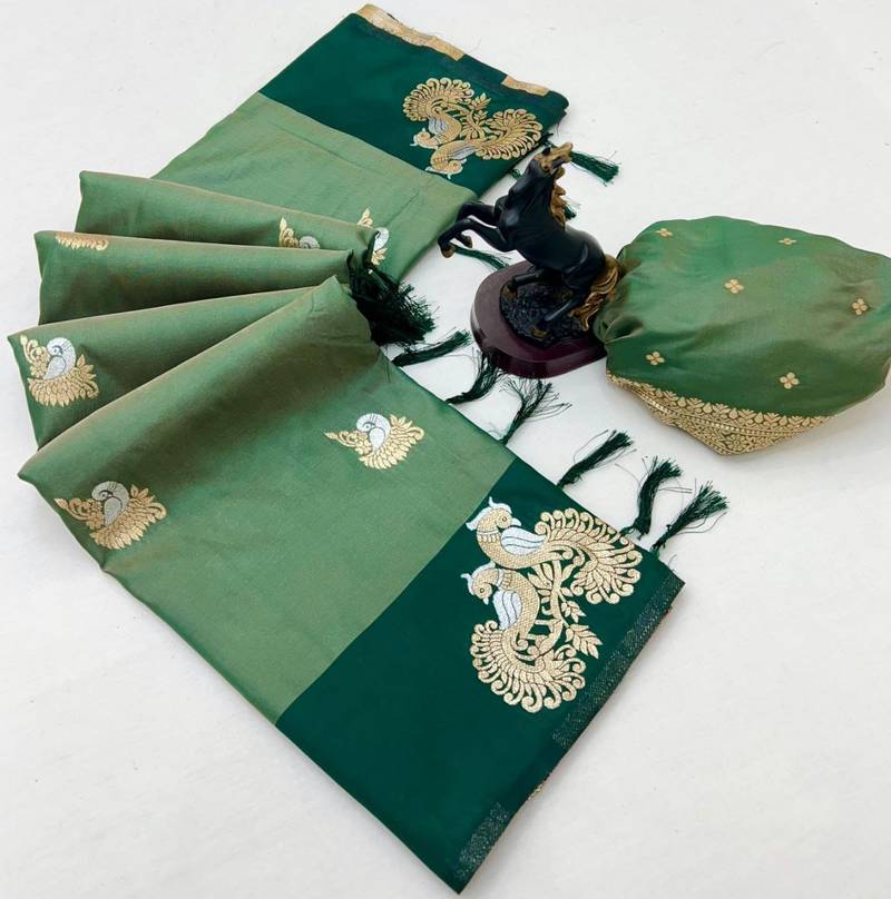 Green soft silk saree with zari weaving & peacock motifs