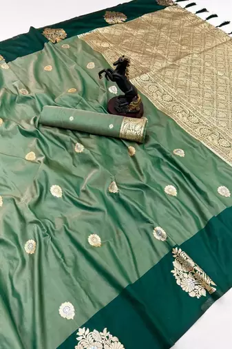 Green soft silk saree with zari weaving & peacock motifs