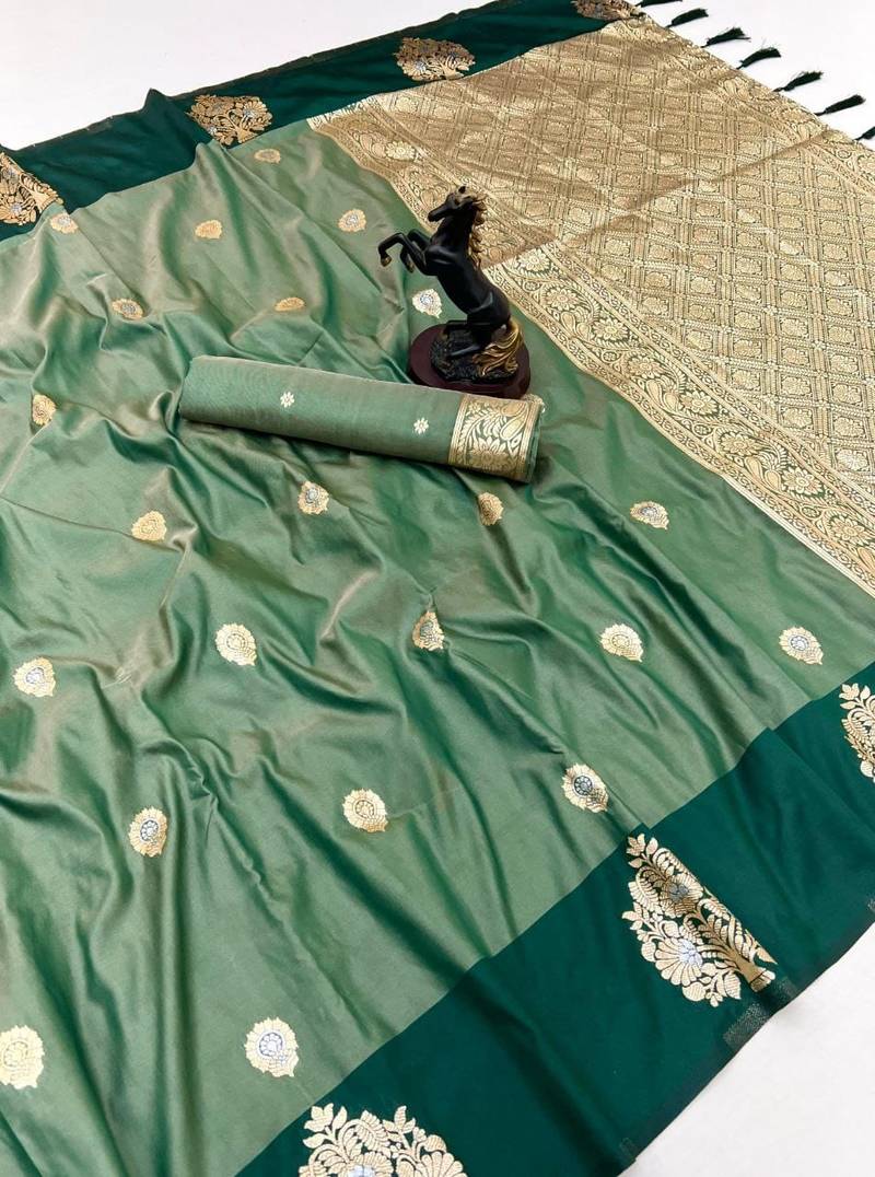 Green soft silk saree with zari weaving & peacock motifs