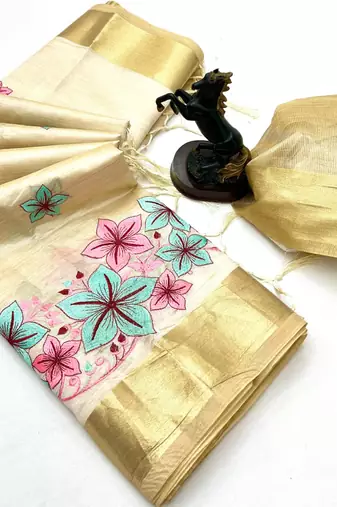 Cream tissue kerala kasavu saree with floral embroidery design