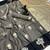 Dark grey soft silk saree with zari weaving & floral motifs