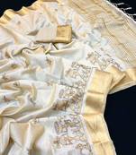 Cream tussar silk saree with kalamkari design & embroidery work
