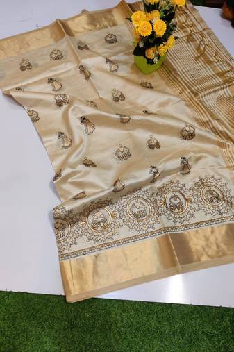 Cream tussar silk saree with kalamkari design & embroidery work