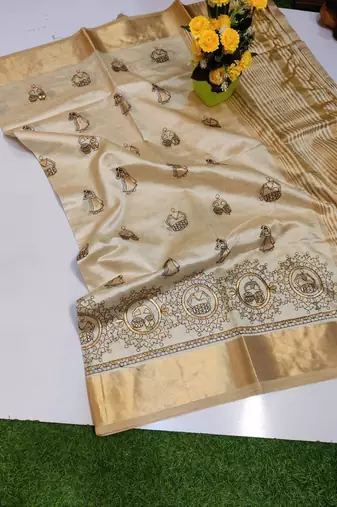 Cream tussar silk saree with kalamkari design & embroidery work