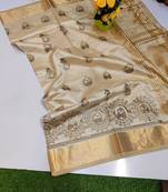 Cream tussar silk saree with kalamkari design & embroidery work