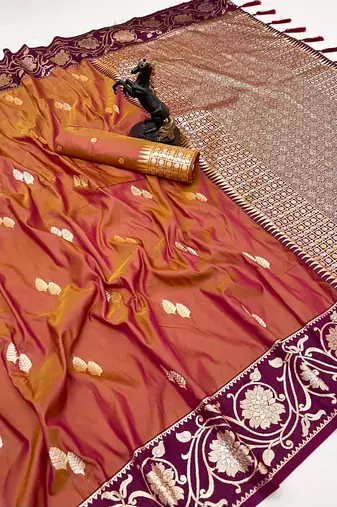Orange premium soft silk saree with zari weaving & floral border