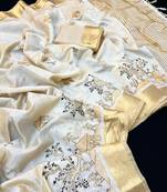 Cream tussar silk saree with kalamkari design & embroidery work