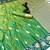 Parrot green premium soft silk saree with zari weaving & floral border