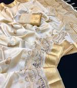 Cream tussar silk saree with kalamkari design & embroidery work