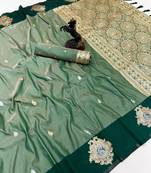 Green soft silk saree with zari weaving & floral motifs