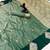 Green soft silk saree with zari weaving & floral motifs