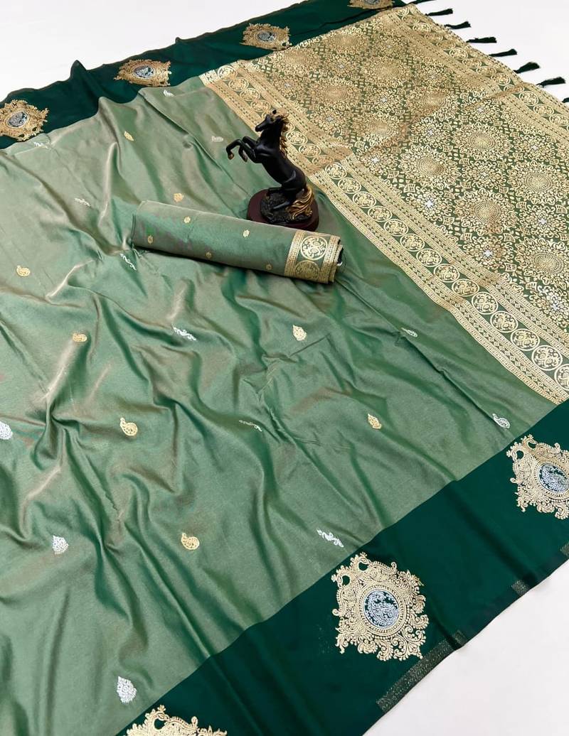 Green soft silk saree with zari weaving & floral motifs