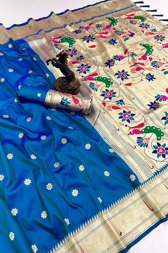 Rama green soft silk paithani saree with flora zari weaving & muniya border