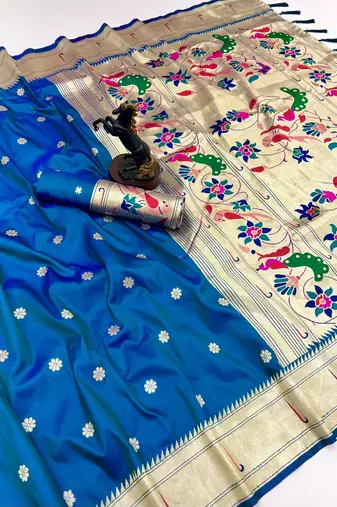 Rama green soft silk paithani saree with flora zari weaving & muniya border