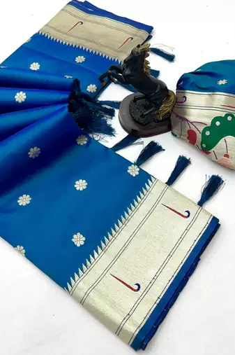 Rama green soft silk paithani saree with flora zari weaving & muniya border