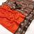 Orange spice silk saree with zari border, check design & floral pallu