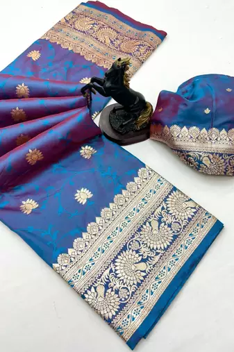 Rama green banarasi silk saree with zari embossed jal design & rich pallu