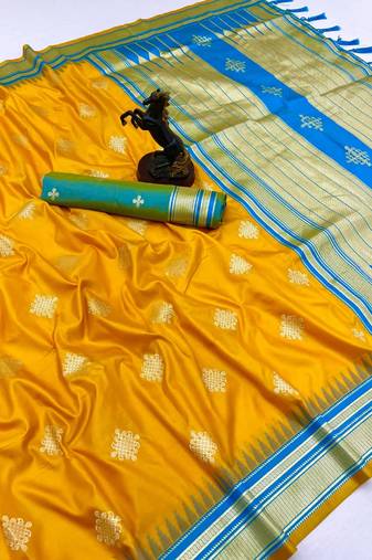 Yellow soft silk saree with kolam zari motifs & designer pallu