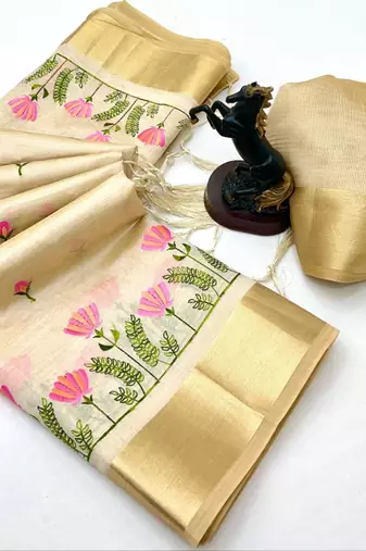 Cream kerala kasavu tissue saree with floral embroidery & zari border