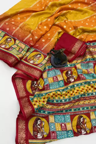 Yellow heritage spice silk saree with lady motif zari border