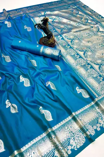 Sky blue banarasi silk saree with zari embossed peacock design