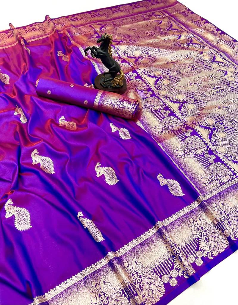 Magenta banarasi silk saree with zari embossed peacock design