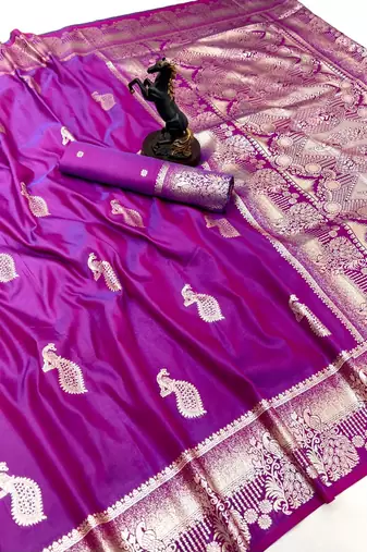 Purple banarasi silk saree with zari embossed peacock design