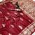 Maroon banarasi silk saree with zari embossed peacock design