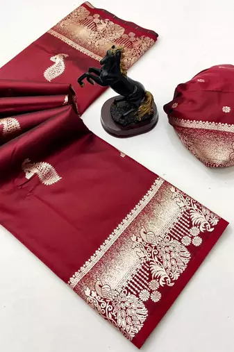 Maroon banarasi silk saree with zari embossed peacock design