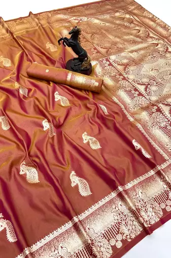 Brown banarasi silk saree with zari embossed peacock design