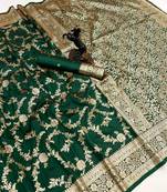 Green banarasi silk saree with zari embossed jal design & rich pallu