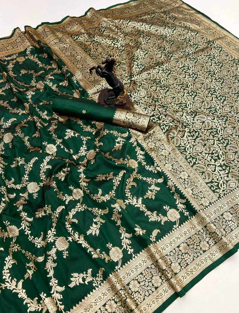 Green banarasi silk saree with zari embossed jal design & rich pallu