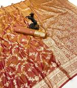 Rust banarasi silk saree with zari embossed jal design & rich pallu