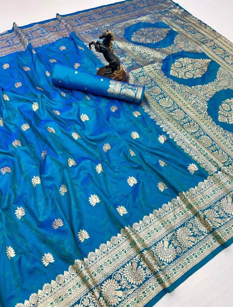 Sky blue banarasi silk saree with zari embossed jal design & rich pallu