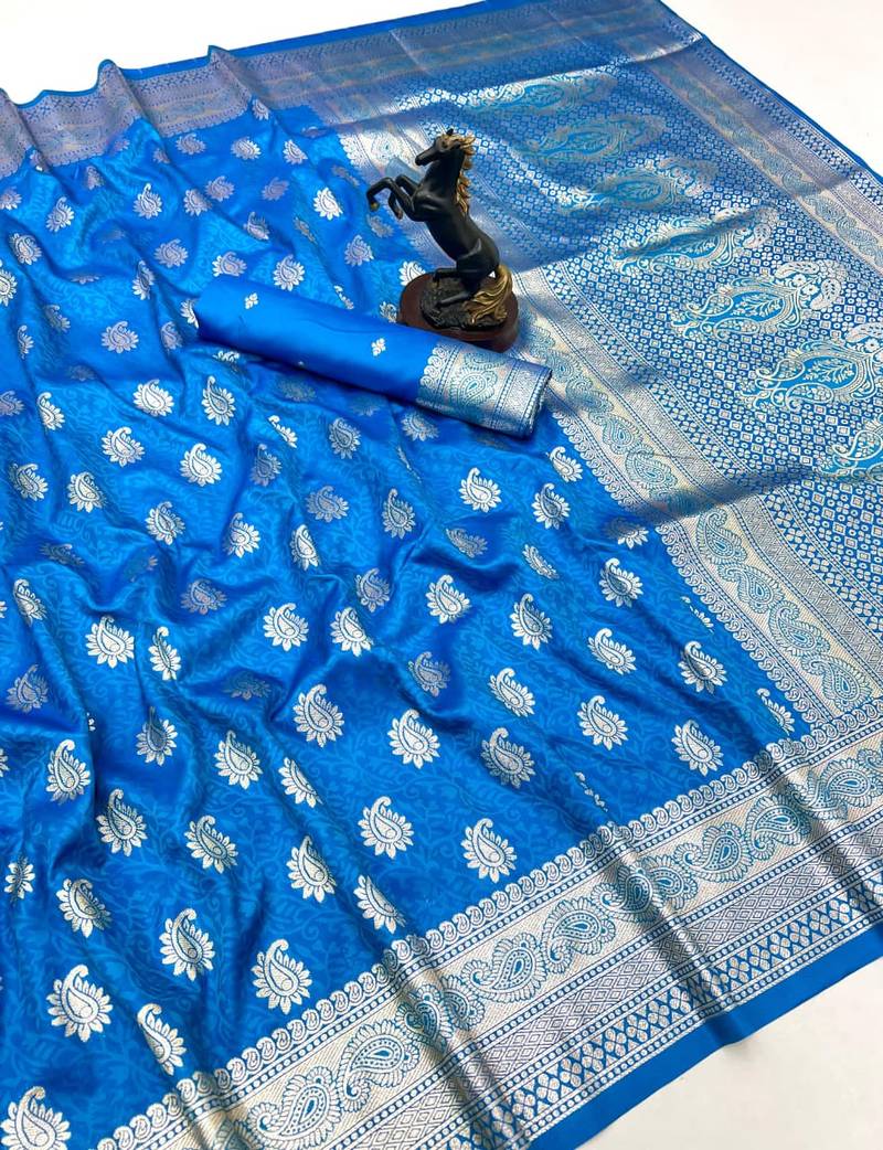 Sky blue banarasi silk saree with zari embossed mango design & rich pallu