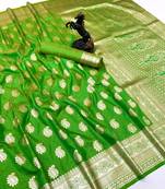 Parrot green banarasi silk saree with zari embossed mango design & rich pallu