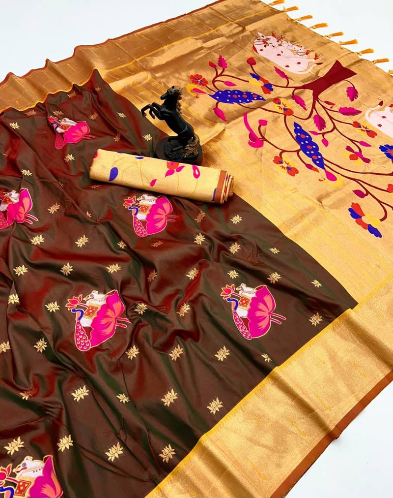 Rust soft silk pichwai paithani saree with lotus butta & double muniya border