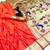 Orange soft silk paithani saree with flora zari weaving & muniya border