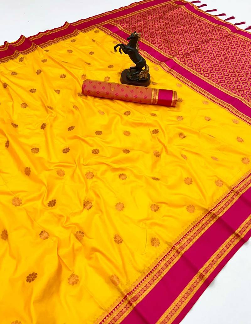 Yellow soft silk saree with dual zari motifs, narayan border & contrast pallu