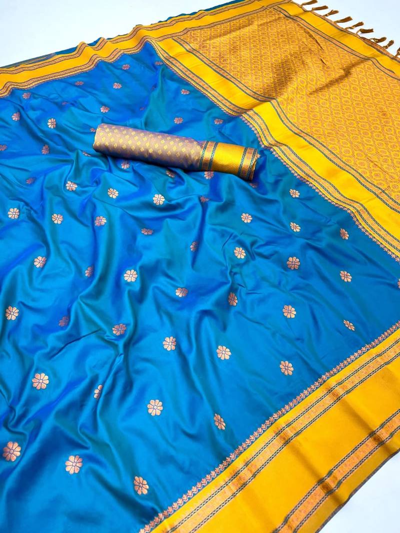 Sky blue soft silk saree with dual zari motifs, narayan border & contrast pallu