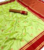 Light green soft silk saree with dual zari motifs, narayan border & contrast pallu