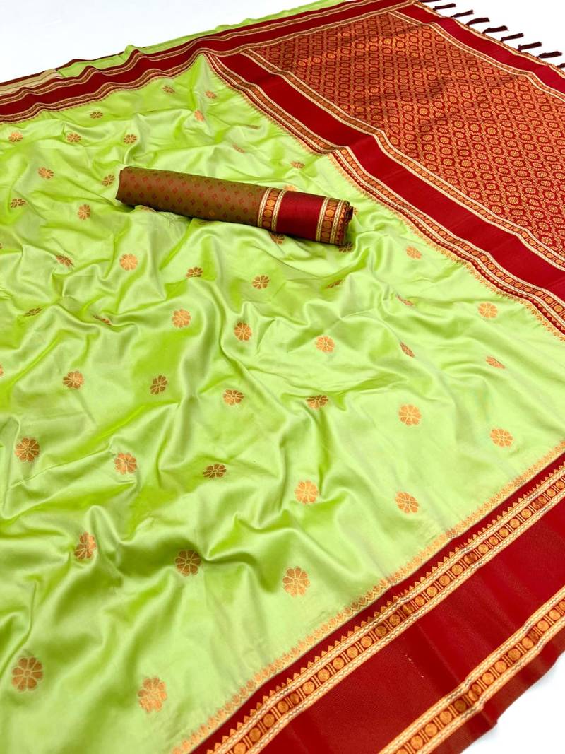 Light green soft silk saree with dual zari motifs, narayan border & contrast pallu