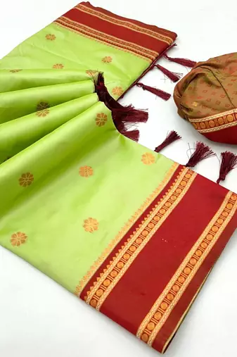 Light green soft silk saree with dual zari motifs, narayan border & contrast pallu