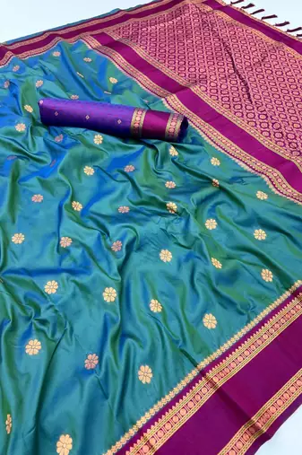 Teal soft silk saree with dual zari motifs, narayan border & contrast pallu