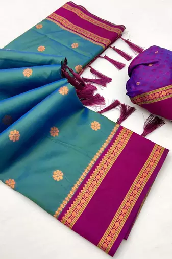 Teal soft silk saree with dual zari motifs, narayan border & contrast pallu